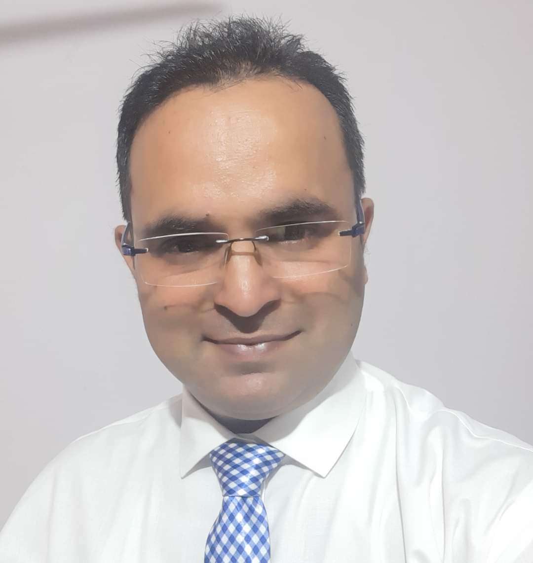 Dr. Haroon Ansari